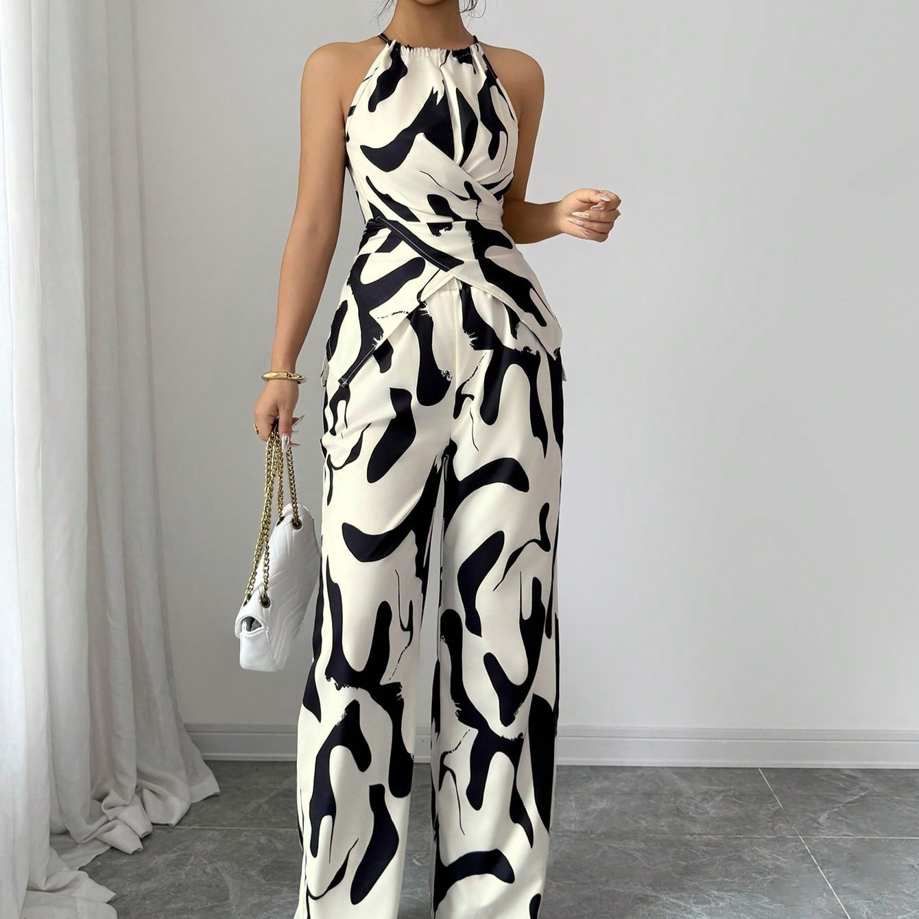 Chic Black and White Milk Pattern Halter Neck Two-Piece Set - Modern Sleeveless Matching Suit