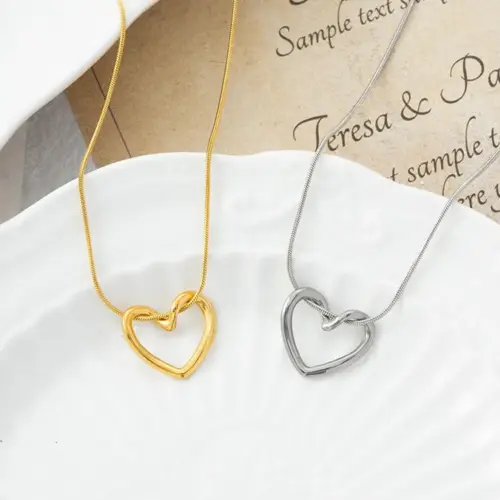 Minimalist Hollow Heart Pendant Necklace – Elegant Titanium Steel Snake Chain Collarbone Jewelry for Women