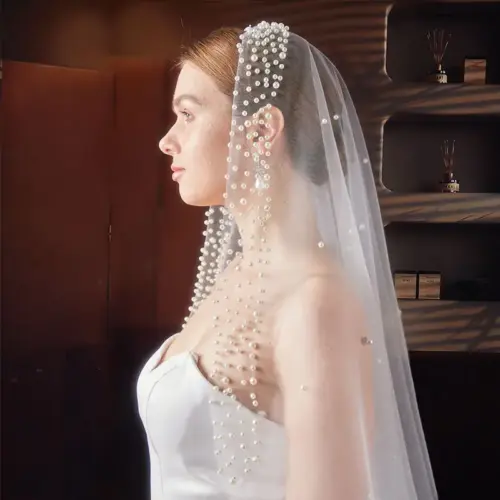 Elegant White Mid-Length Bridal Veil with Delicate Beaded Embellishments & Hair Comb